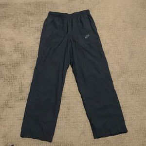 Black Nike track pants